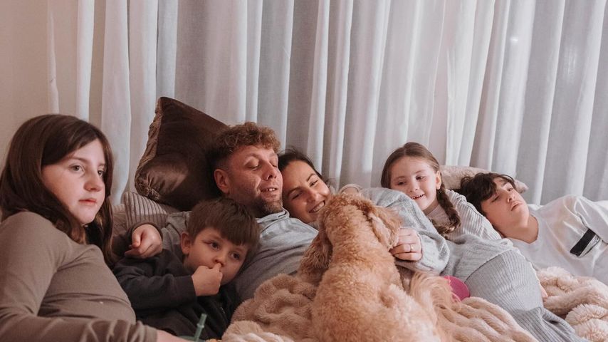 Kimberly Devlin-Mania (dritte von rechts) und ihre Familie