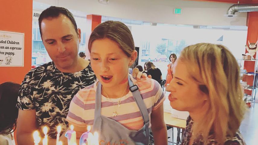 Leslie Grossman und ihr Mann mit ihrer Tochter