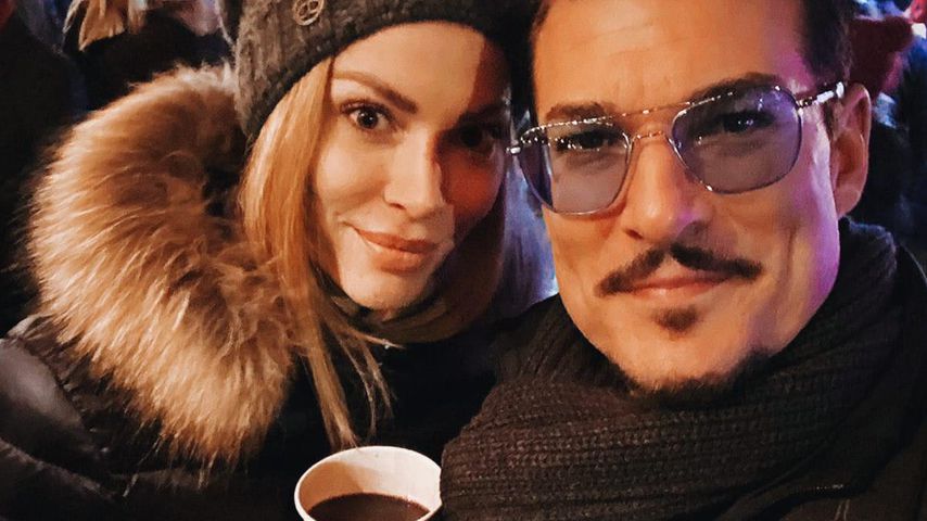 Lili und Chris Töpperwien auf einem Weihnachtsmarkt