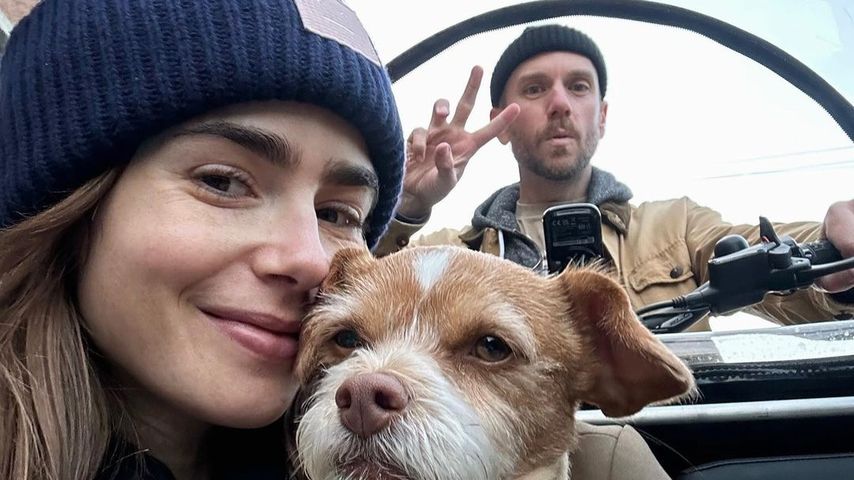 Lily Collins und Charlie McDowell mit ihrem Hund
