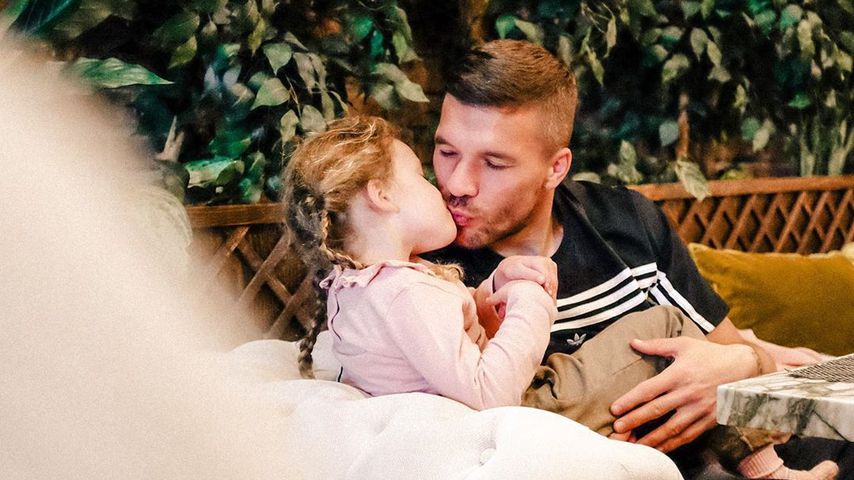 Lukas Podolski und Tochter Maya