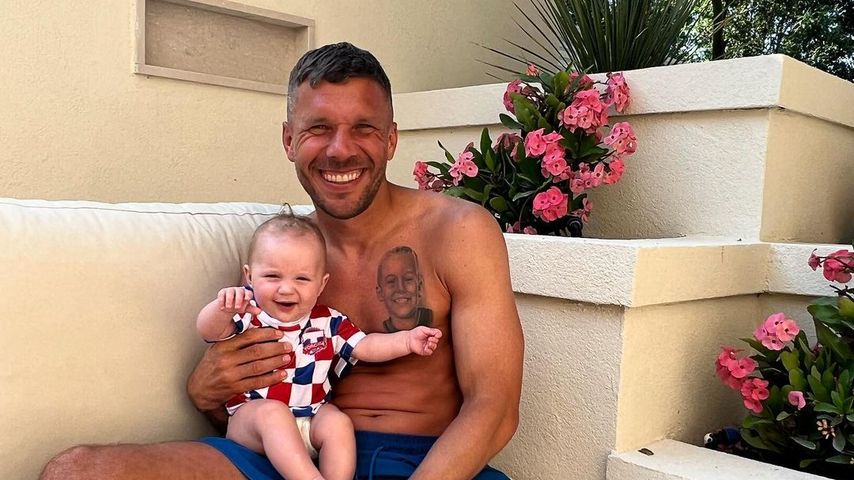 Lukas Podolski und seine Tochter Ella