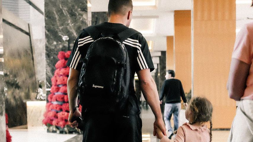Lukas Podolski und seine Tochter Maya