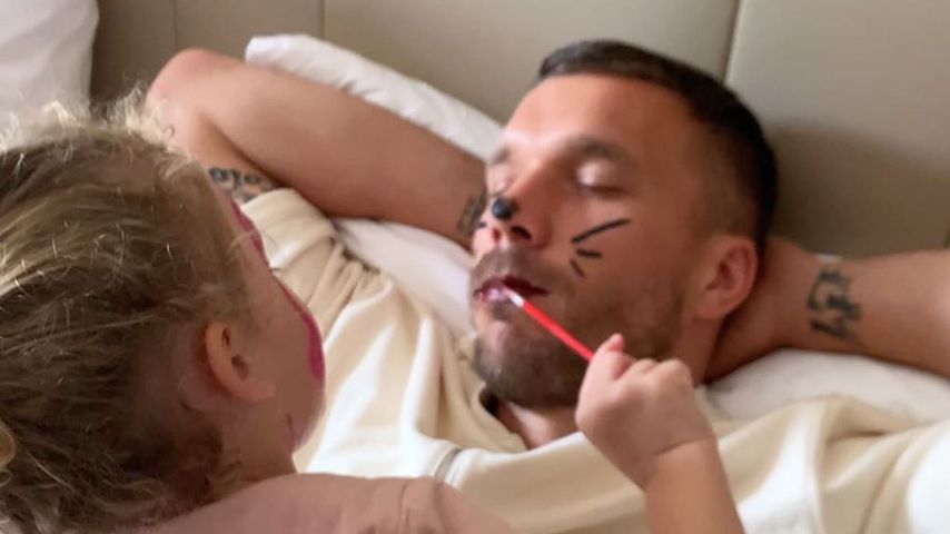 Lukas Podolski und seine Tochter