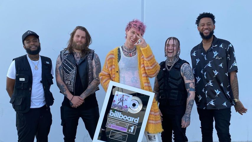 Machine Gun Kelly und sein Team im April 2022