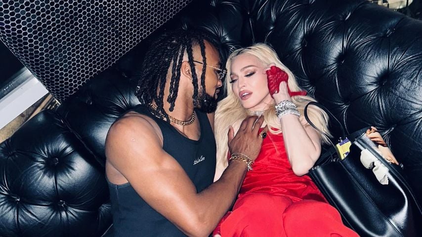 Madonna, Sängerin, mit einem unbekannten Mann