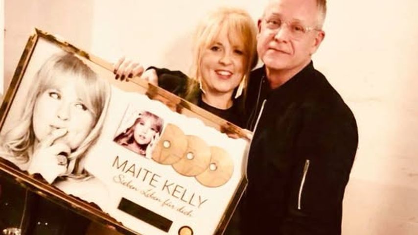 Maite Kelly und Roberto Monden nehmen Auszeichnung an, 2018