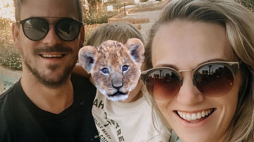 Marc Barthel und Anna Hofbauer mit Söhnchen Leo, August 2021