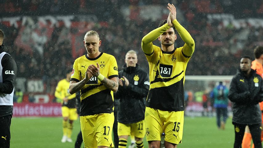 Marius Wolf und Mats Hummels im Dezember 2023