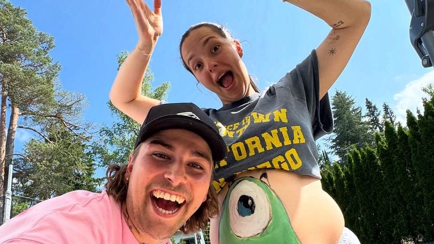 Matthias und Lejla Höhn mit bemaltem Babybauch