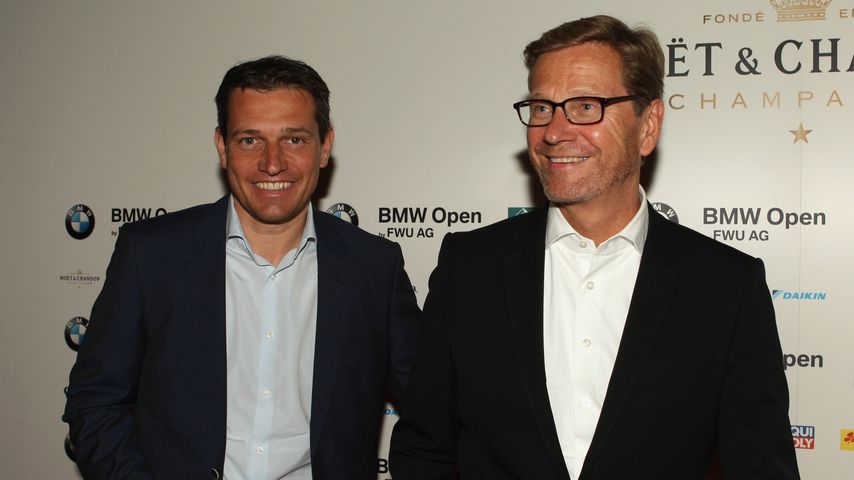 Michael Mronz und Guido Westerwelle bei der BMW Players Night in München, April 2014