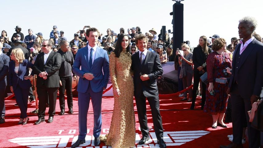 Miles Teller, Jennifer Connelly und Tom Cruise im Mai 2022