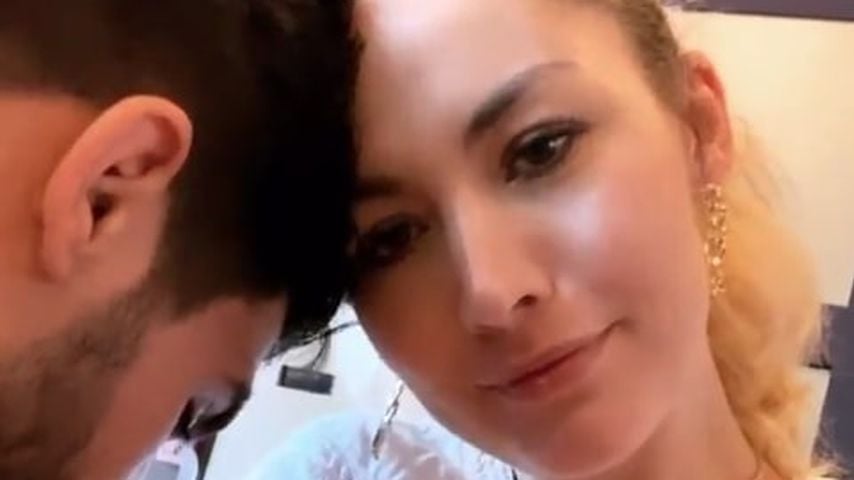 Model Fiona Erdmann mit ihrem Lebensgefährten und ihrem Sohn