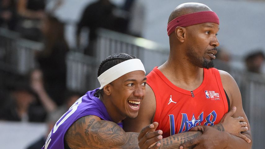 Nick Cannon mit Jamie Foxx bei dem NBA All-Star Celebrity Game