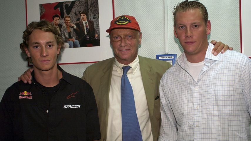 Niki Lauda (mitte) mit seinen Söhnen Mathias und Lukas