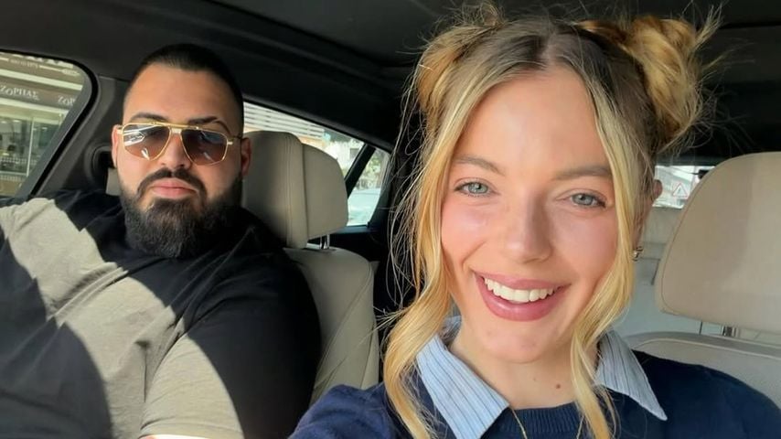 Olivia Laurea im Auto mit ihrem Verlobten Ashkan Saberian im April 2025