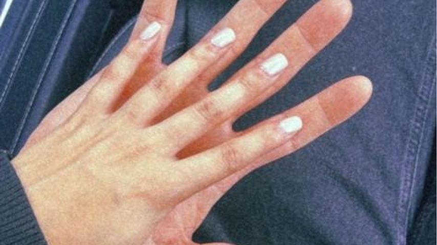 Paola Marias Hand und eine Männerhand