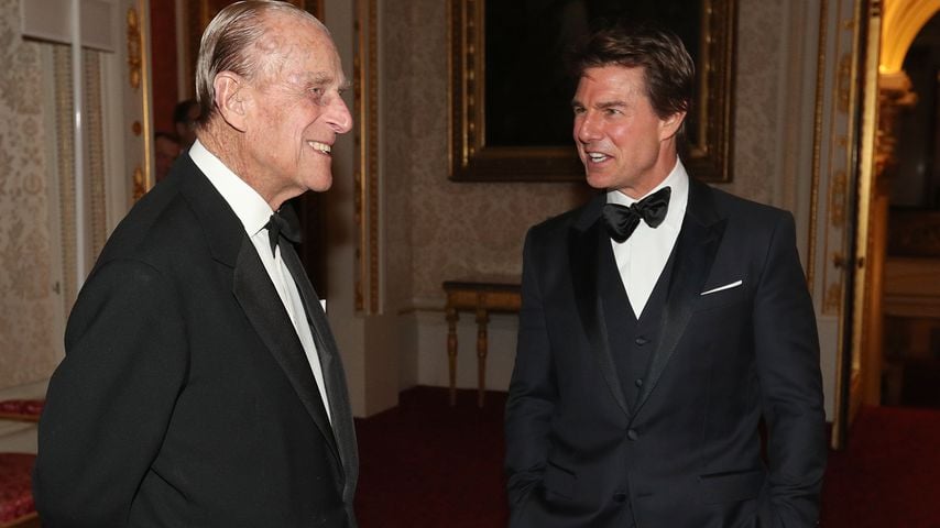 Prinz Philip und Tom Cruise (v.l.) im Buckingham Palace in London