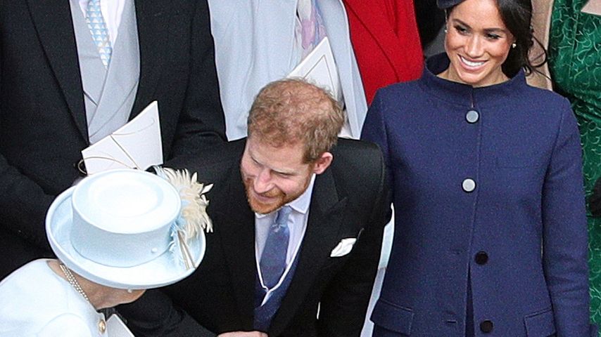 Queen Elizabeth II., Prinz Harry und Herzogin Meghan bei der Hochzeit von Prinzessin Eugenie