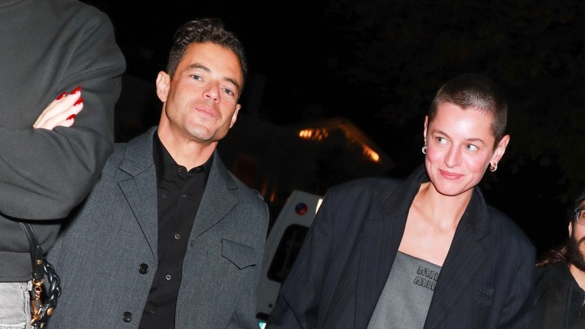 Rami Malek und Emma Corrin verlassen Hand in Hand eine Party