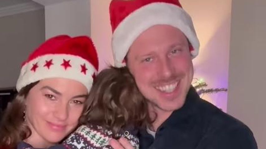 Renata und Valentin Lusin mit Tochter Stella, Dezember 2024