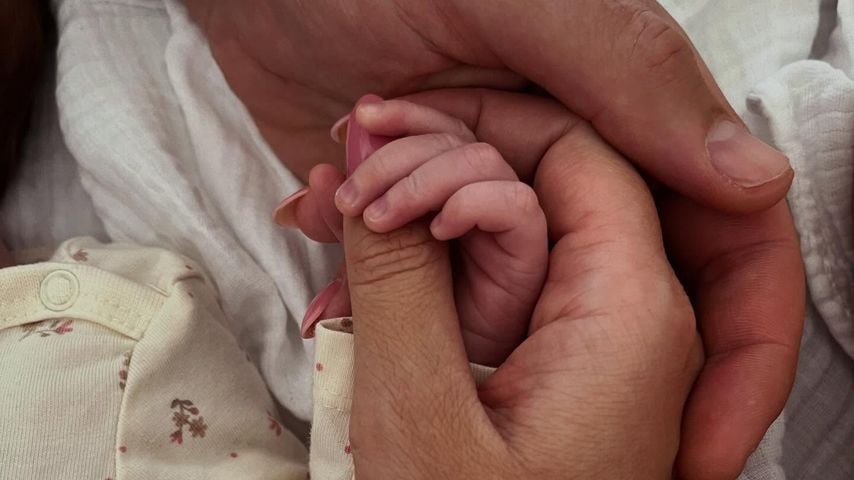 Robert und Marina mit ihrer neugeborenen Tochter