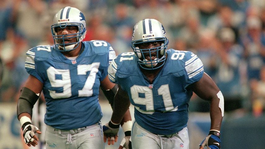 Robert Porcher und Tracy Scroggins im Spiel der Detroit Lions gegen die Minnesota Vikings im Silverdome, 1. Oktober 2000