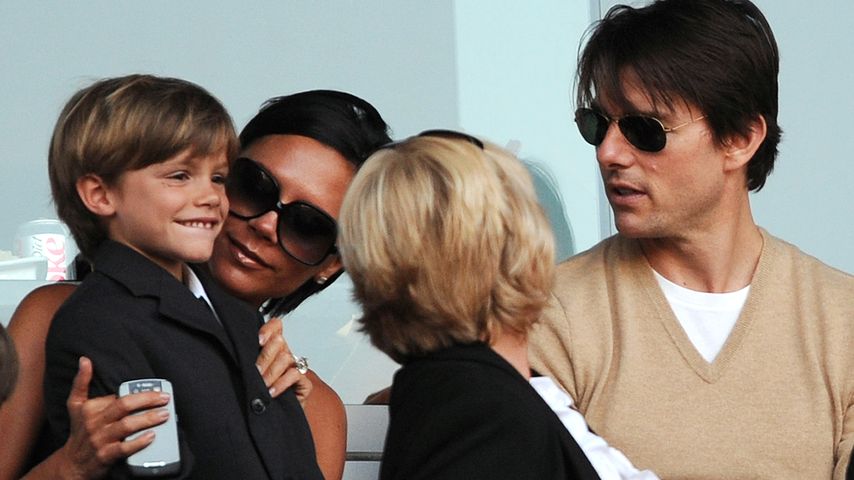 Romeo Beckham, Victoria Beckham und Tom Cruise im Jahr 2009