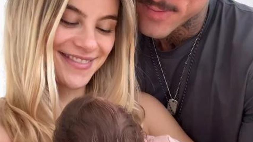 Influencer Romina Palm und Christian Wolf mit ihrer Tochter Hazel, Mai 2025