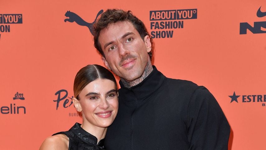 Romina Palm und Christian Wolf bei der ABOUT YOU Opera Modenschau in Berlin, 07.10.2026