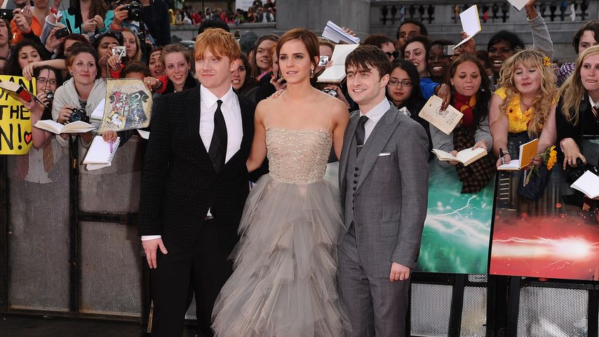 Rupert Grint, Emma Watson und Daniel Radcliffe im Juli 2011