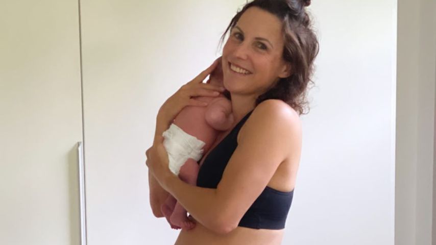 Sabrina Mockenhaupt mit ihrer Tochter eine Woche nach der Geburt, Juni 2020