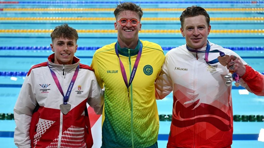 Sam Williamson, Filip Nowacki und Adam Ramsay-Peaty nach dem 100-m-Brust-Finale bei den Commonwealth Games 2026 in Glasgow