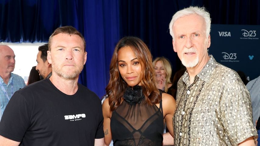 Sam Worthington, Zoe Saldana und James Cameron, August 2024