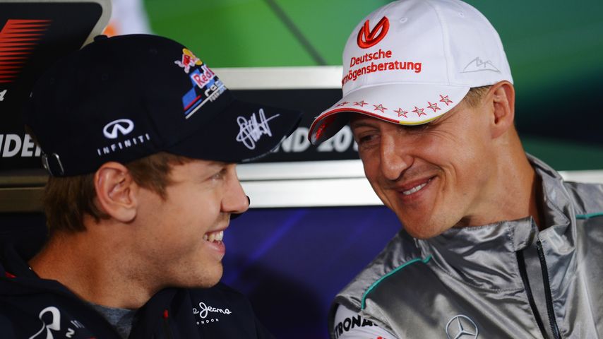 Sebastian Vettel und Michael Schumacher beim Hockenheimring, Juli 2012