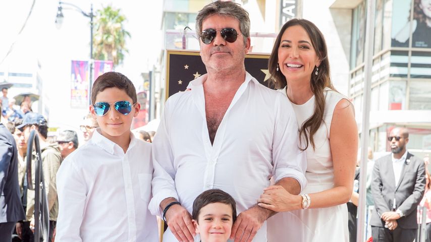 Simon Cowell, seine Verlobte Lauren Silverman und ihre Kinder Eric und Adam