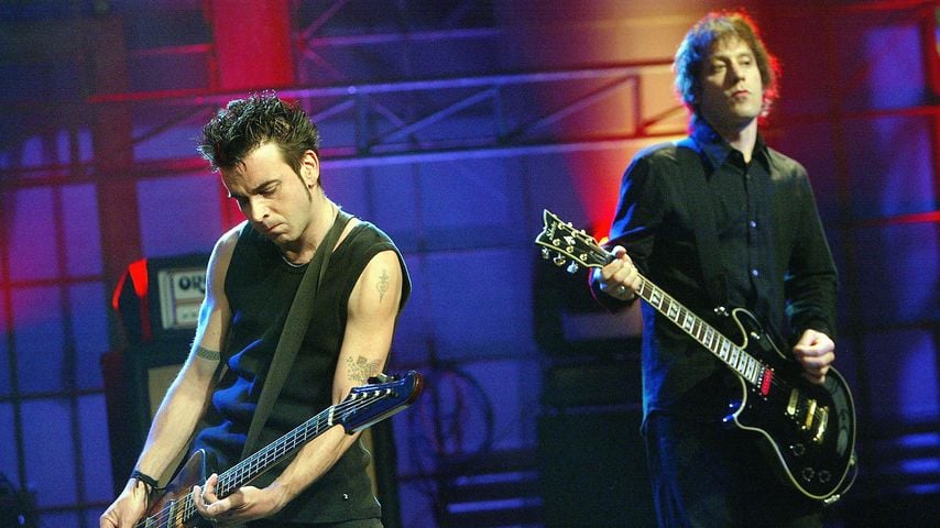 Simon Gallop und Perry Bamonte, Musiker der Band The Cure