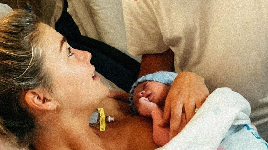 Steph Claire Smith und ihr Mann Josh Miller mit ihrem gemeinsamen Sohn