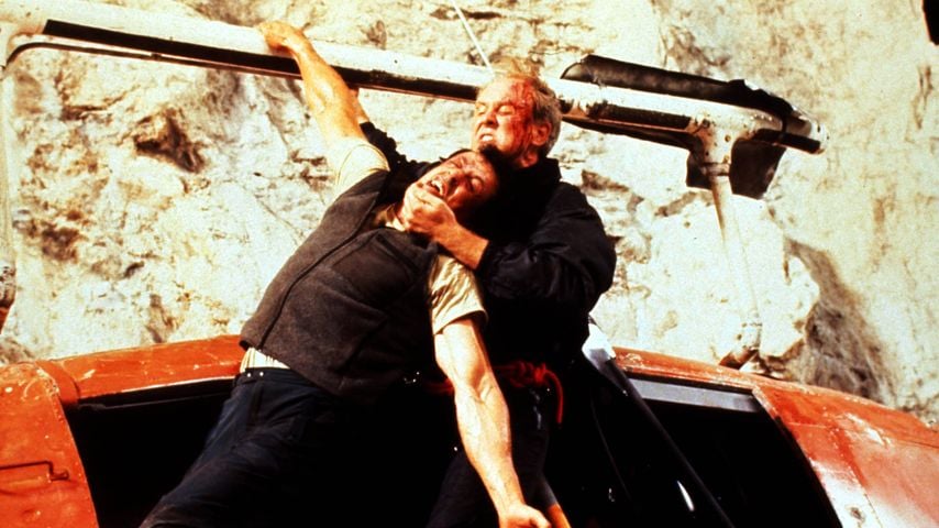 Sylvester Stallone und John Lithgow im Actionfilm "Cliffhanger", 1993