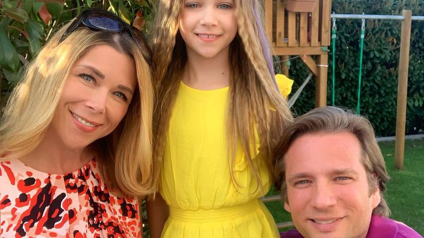 Tanja Szewczenko, ihre Tochter Jona und ihr Mann Norman in Köln im Mai 2020