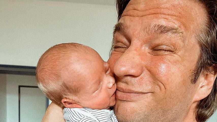 Tanja Szewczenkos Mann Norman mit seinem Sohn