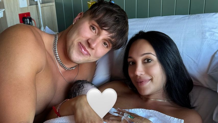Tayo Ricci und Scarlet Vas mit ihrem Baby, Dezember 2024
