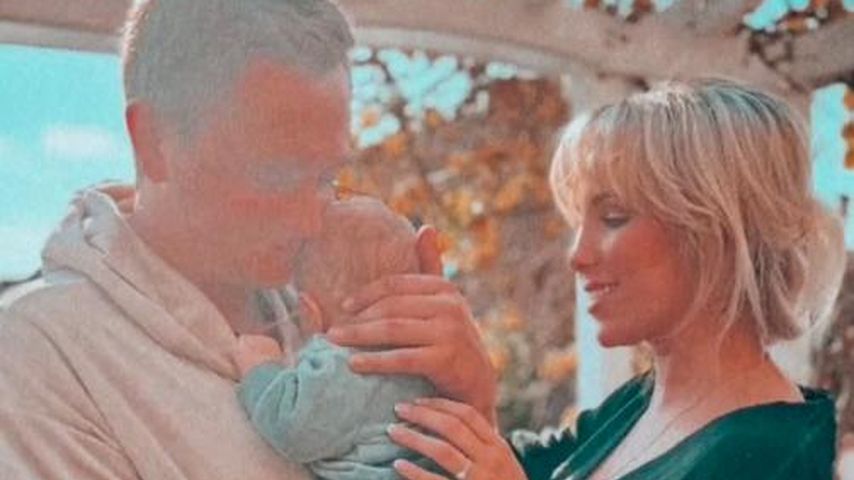 Tim Sandt und Annemarie Eilfeld mit ihrem Sohn