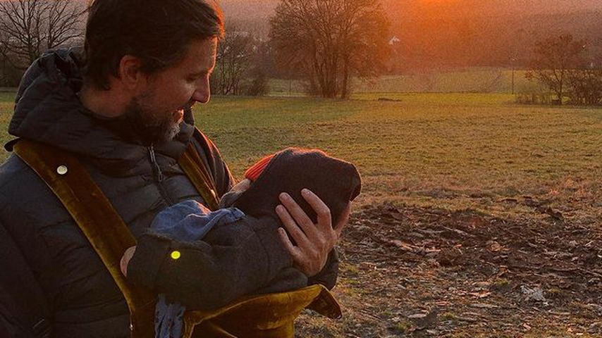 Tom Beck mit seinem Kind