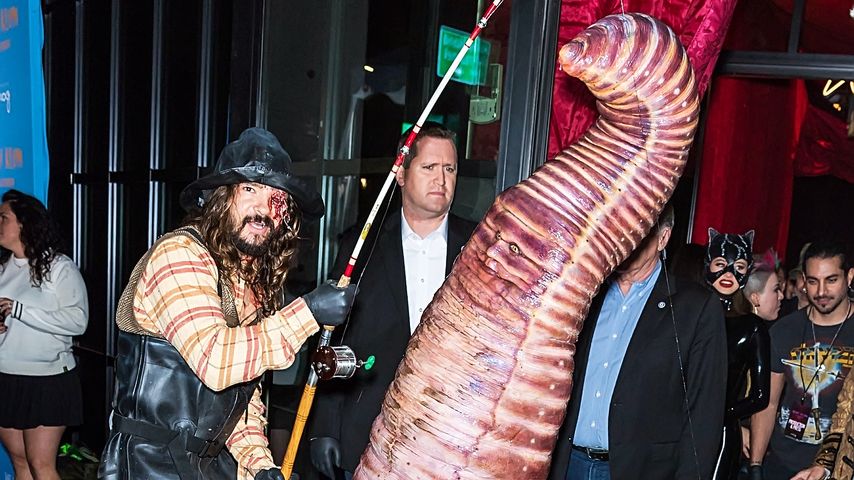 Tom Kaulitz und Heidi Klum als Zombie-Angler und riesiger Regenwurm, Oktober 2022