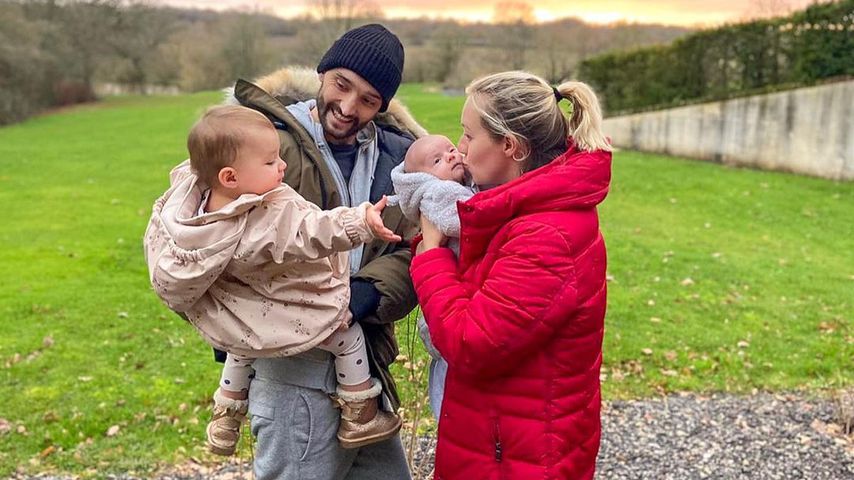 Tom Parker, seine Frau Kelsey und ihre zwei Kinder