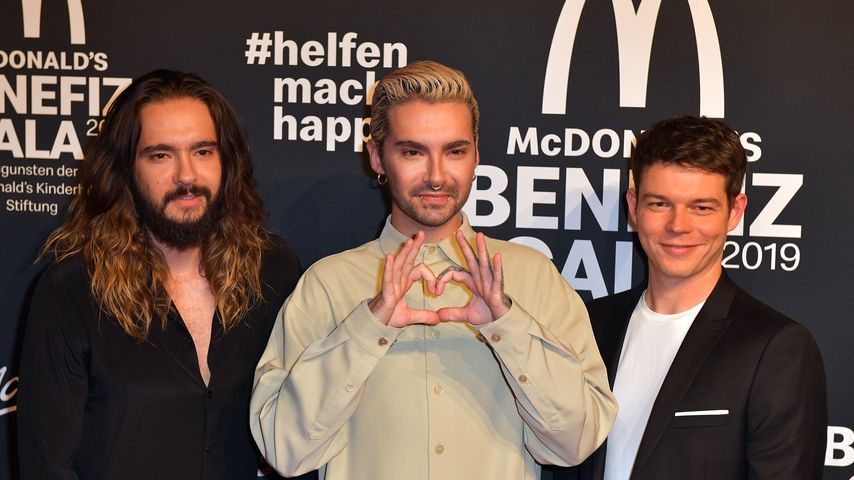 Tom und Bill Kaulitz mit Georg Listing