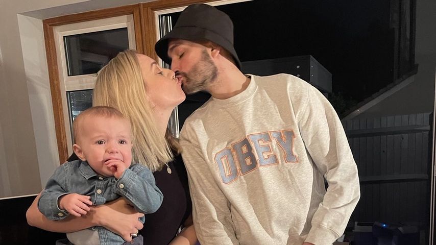 Tom und Kelsey Parker mit ihren beiden Kindern