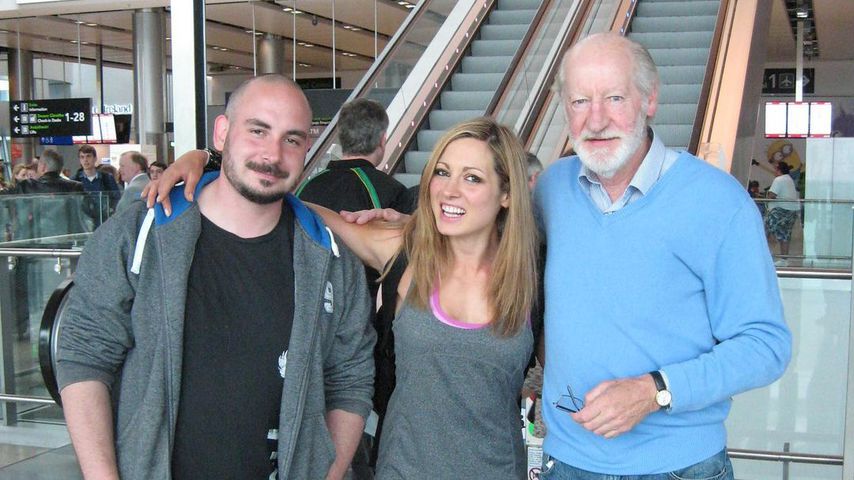 Wrestlerin Becky Lynch mit ihrem Bruder und ihrem Vater