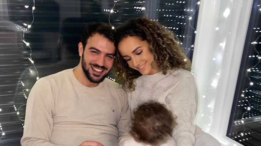 Yasin und Samira mit ihrem Sohn Malik